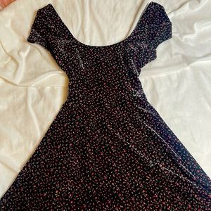 Beautiful dress! A little open back